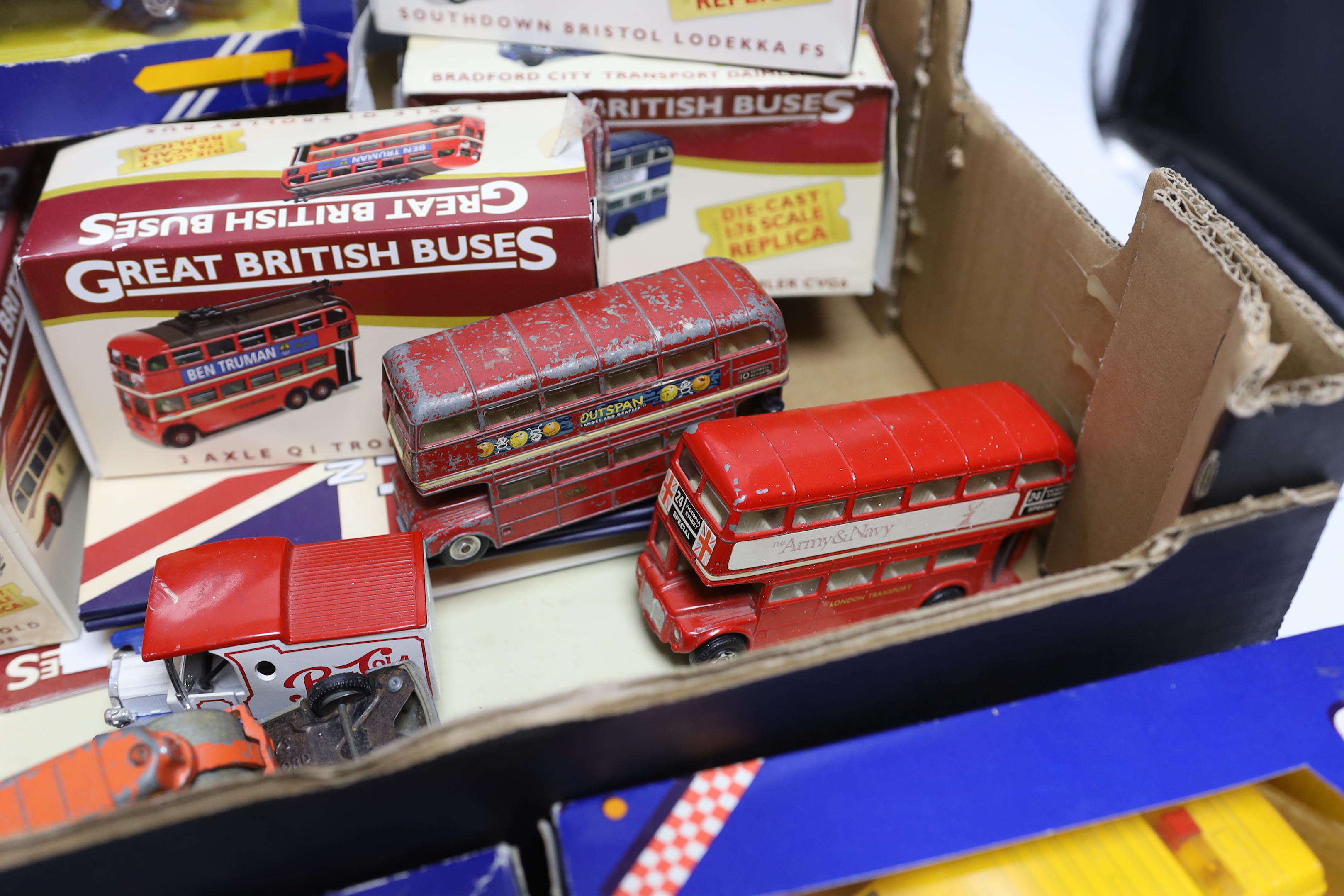 A quantity of boxed model cars, including Great British Buses, Corgi and Dinky